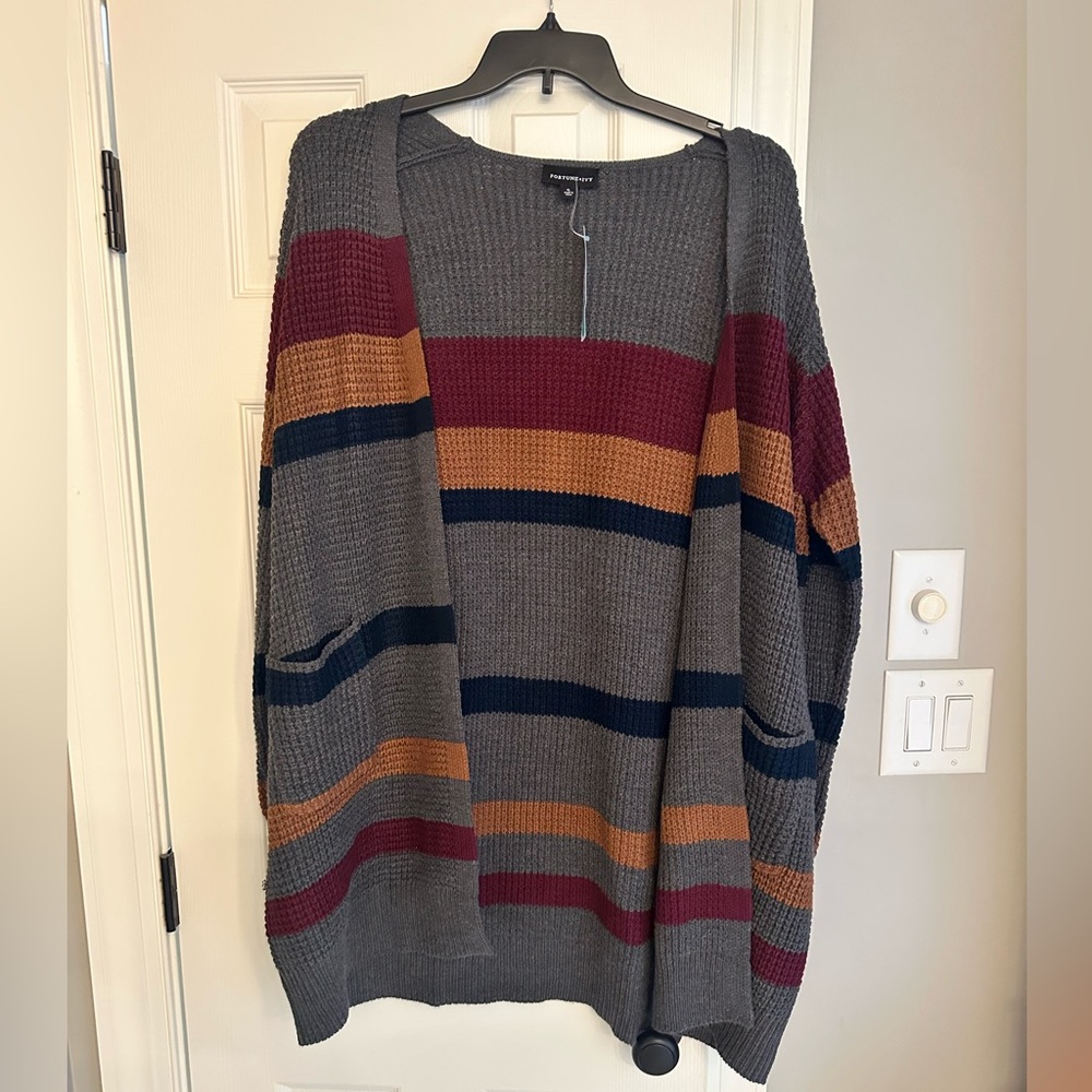 New with tags. Stripped cardigan sweater.